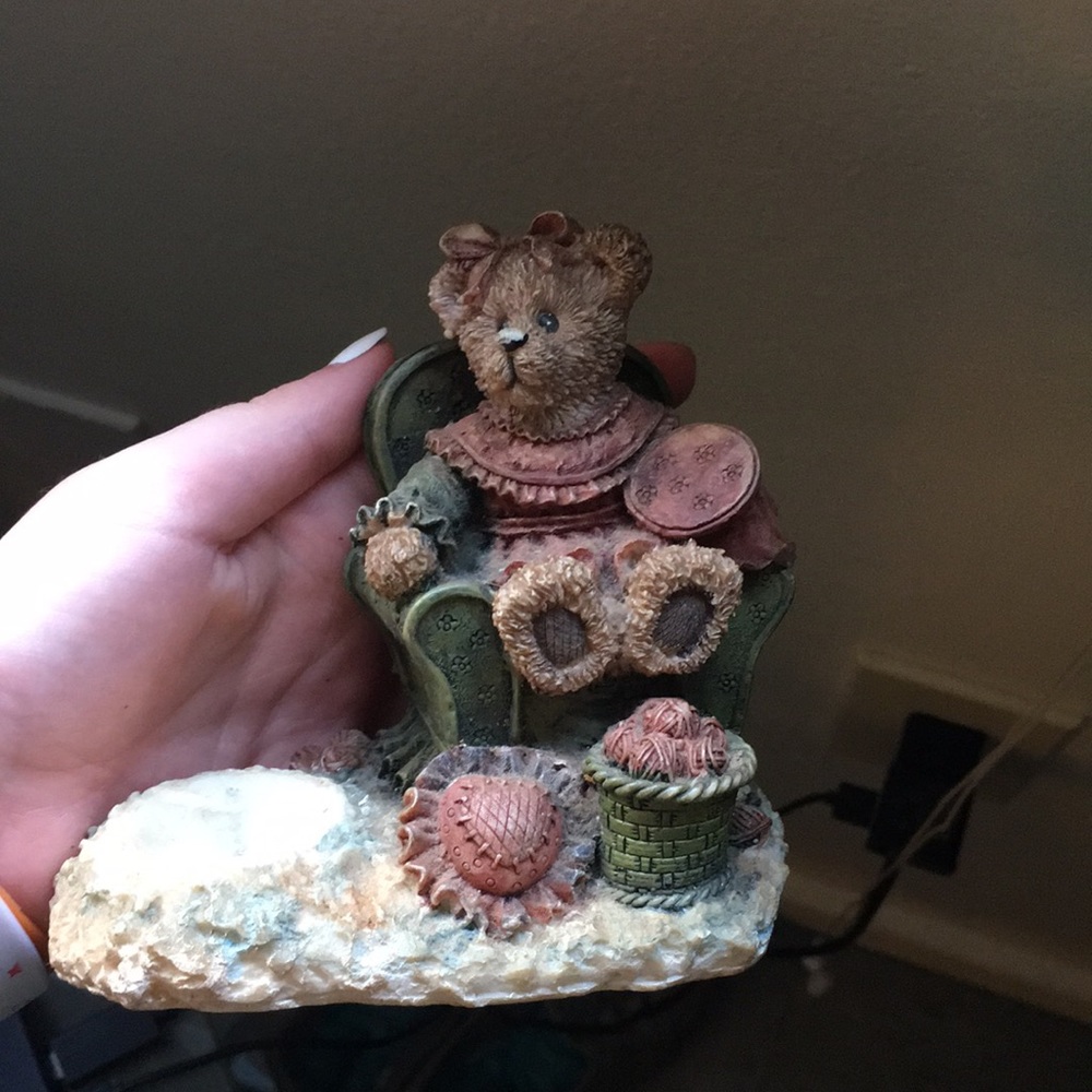 A brown candle holder (teddy bear) girl antique